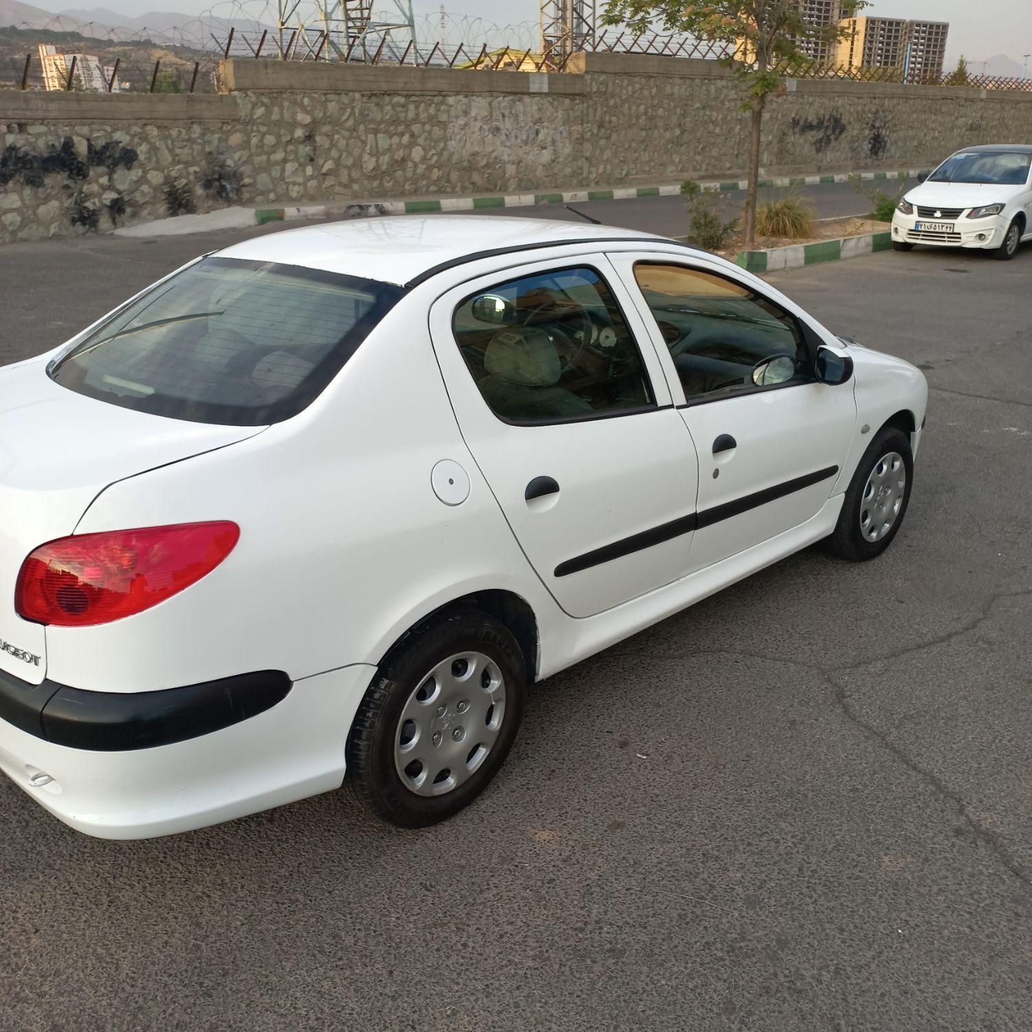 پژو ۲۰۶ صندوق دار v8 - 1396