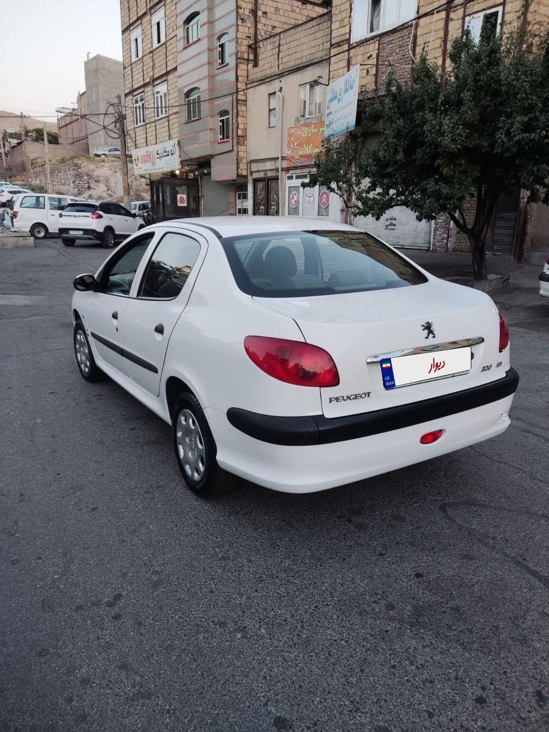 پژو ۲۰۶ صندوق دار v8 - 1399