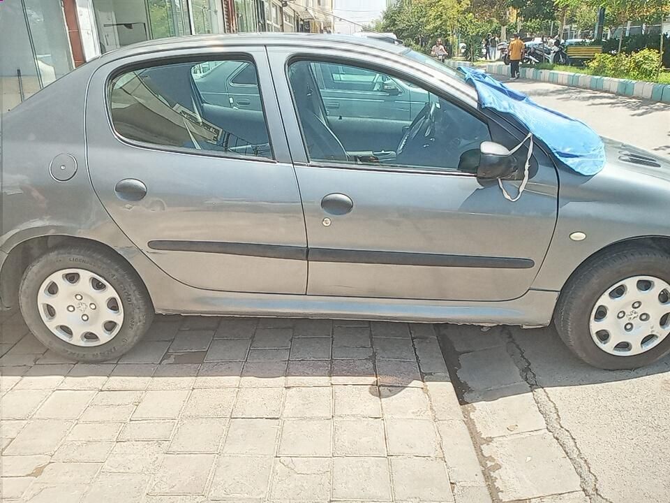 پژو ۲۰۶ صندوق دار v8 - 1394