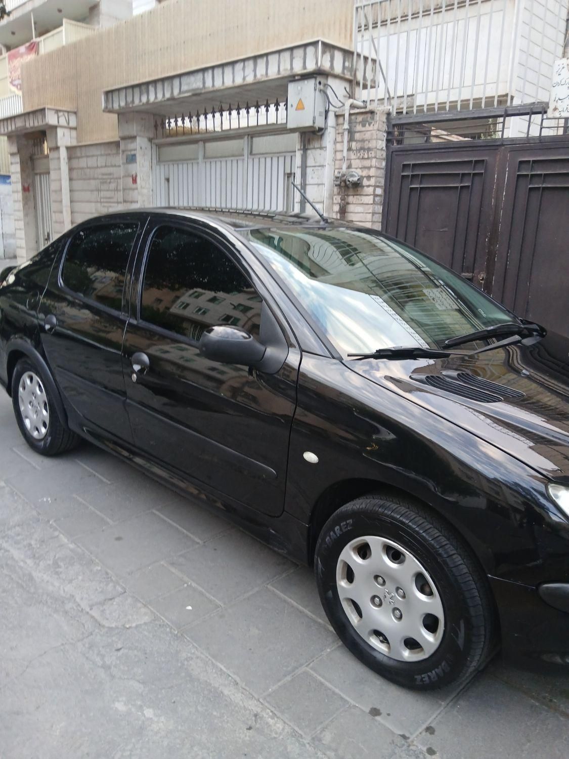 پژو ۲۰۶ صندوق دار v8 - 1396