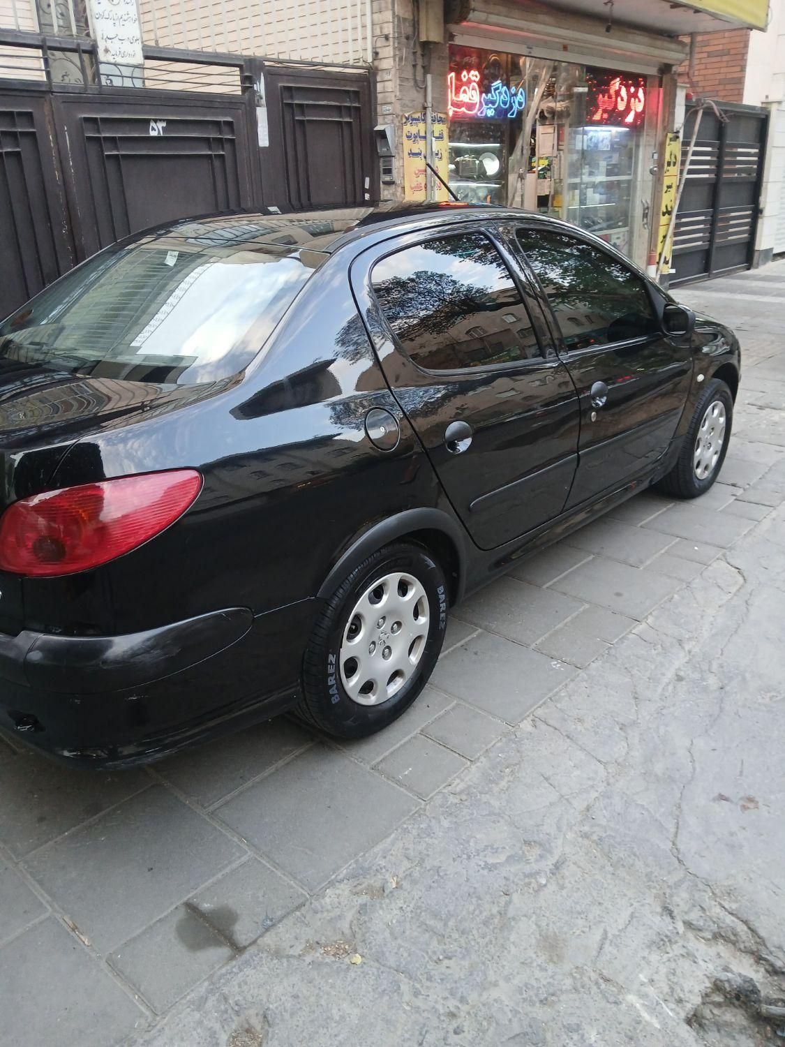 پژو ۲۰۶ صندوق دار v8 - 1396
