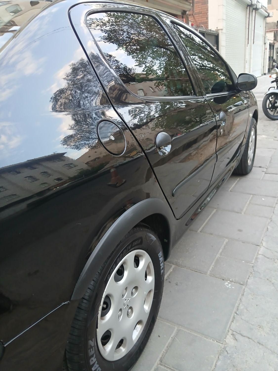 پژو ۲۰۶ صندوق دار v8 - 1396