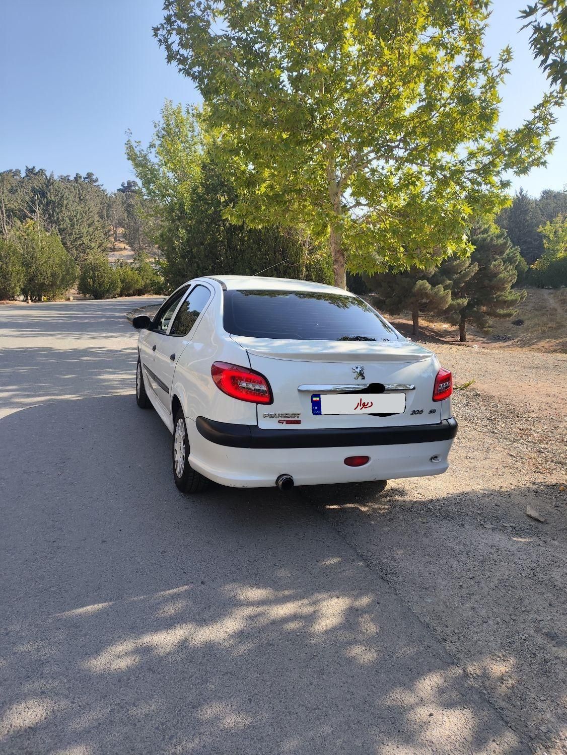 پژو ۲۰۶ صندوق دار v8 - 1394