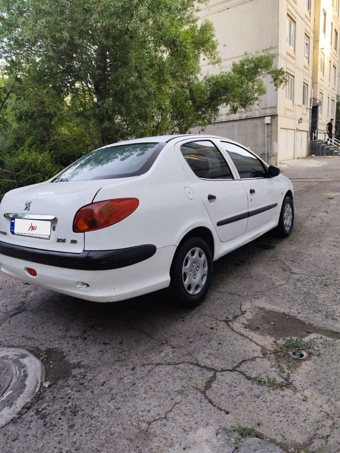 پژو ۲۰۶ صندوق دار v8 - 1393