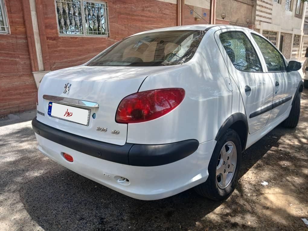 پژو ۲۰۶ صندوق دار v8 - 1396