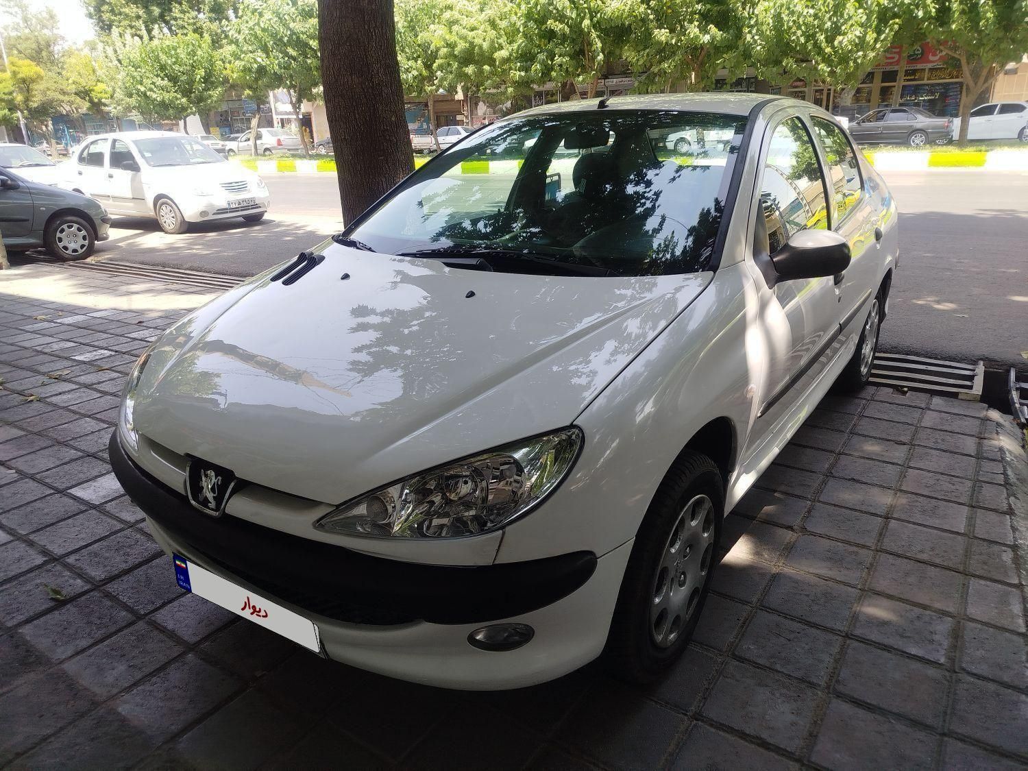 پژو ۲۰۶ صندوق دار v8 - 1394