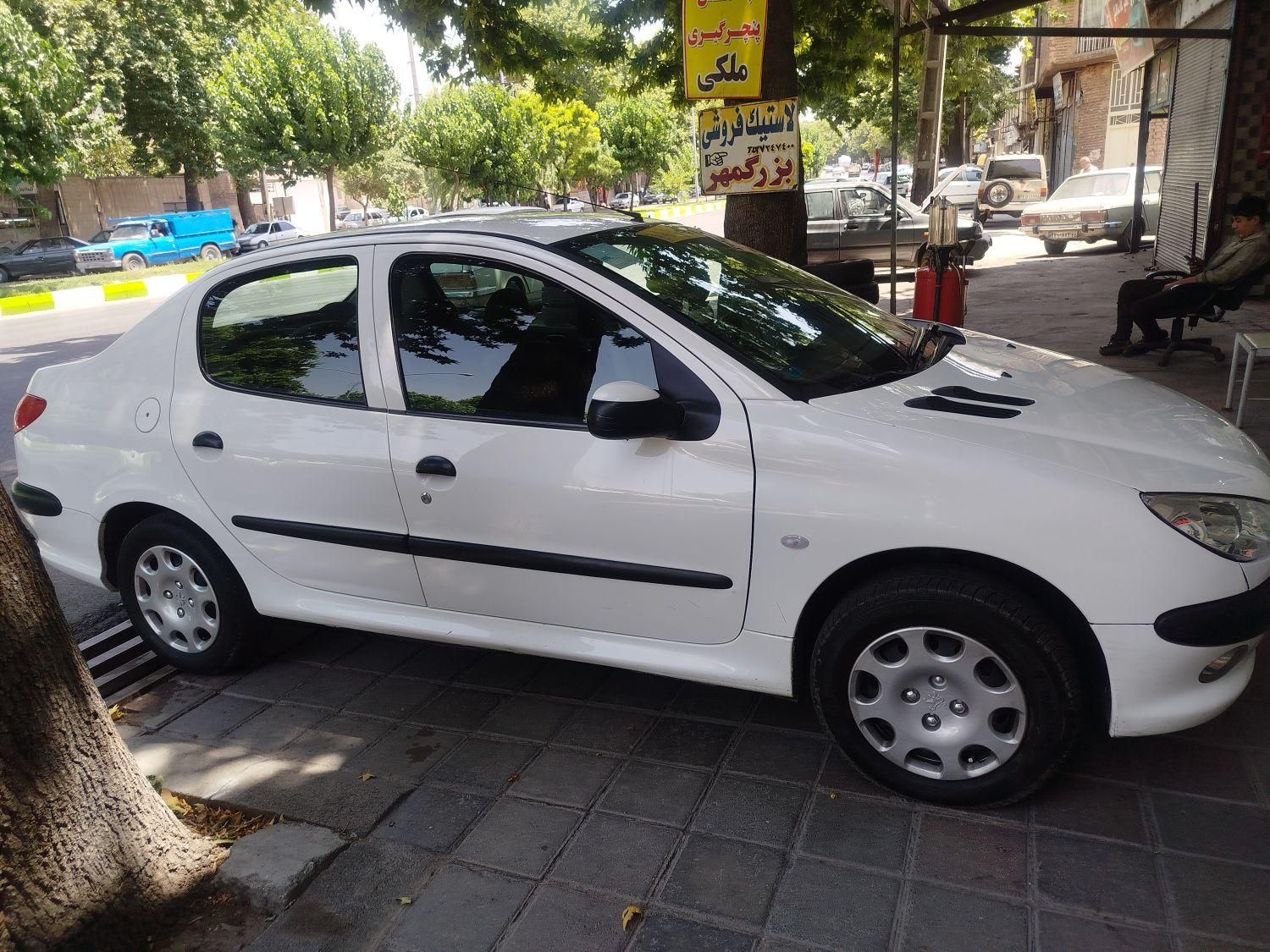 پژو ۲۰۶ صندوق دار v8 - 1394
