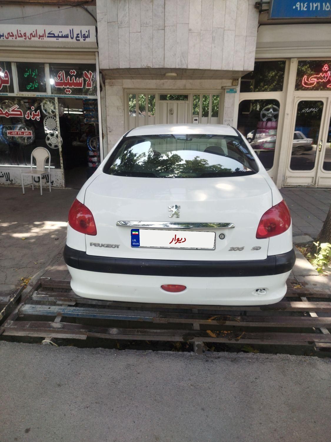 پژو ۲۰۶ صندوق دار v8 - 1394