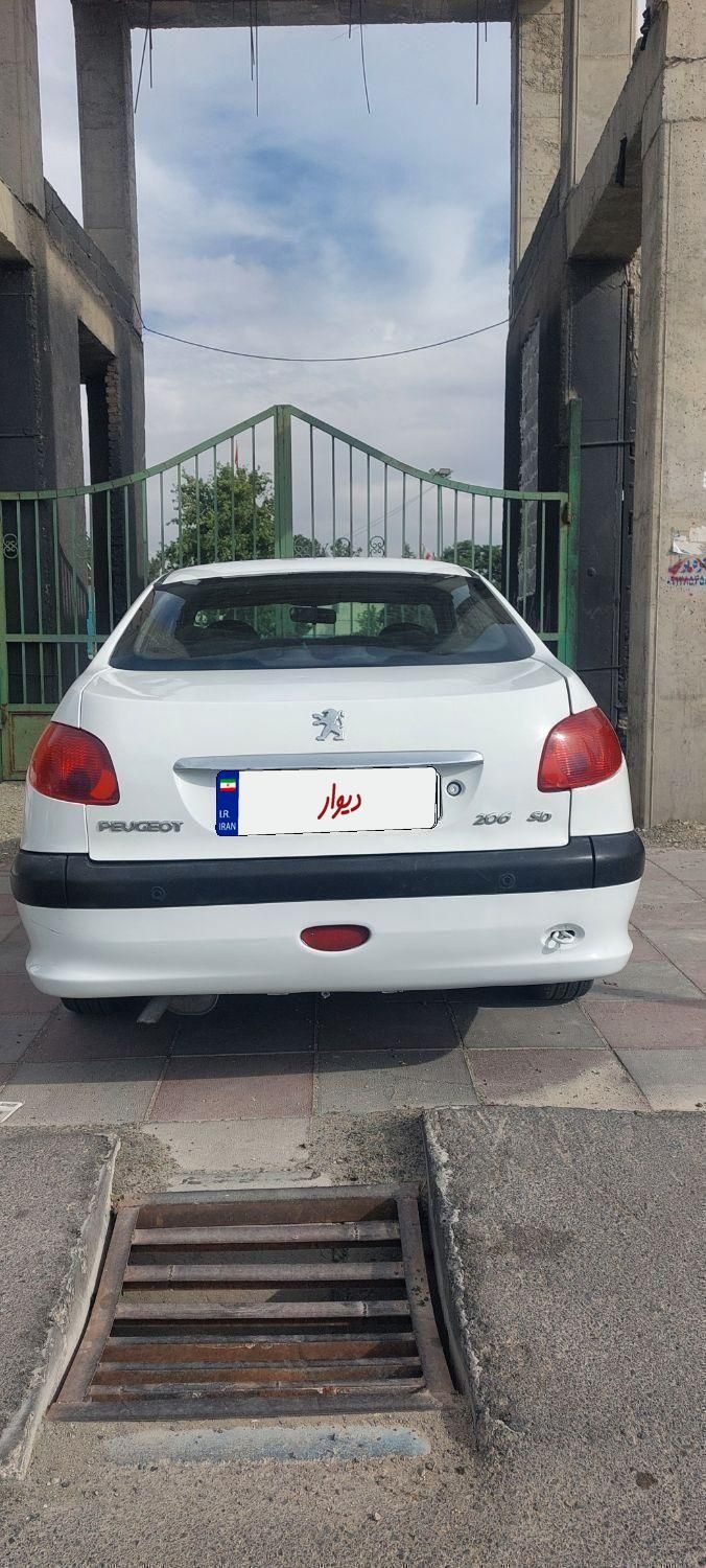 پژو ۲۰۶ صندوق دار v8 - 1393