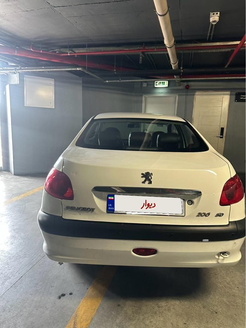 پژو ۲۰۶ صندوق دار v8 - 1398