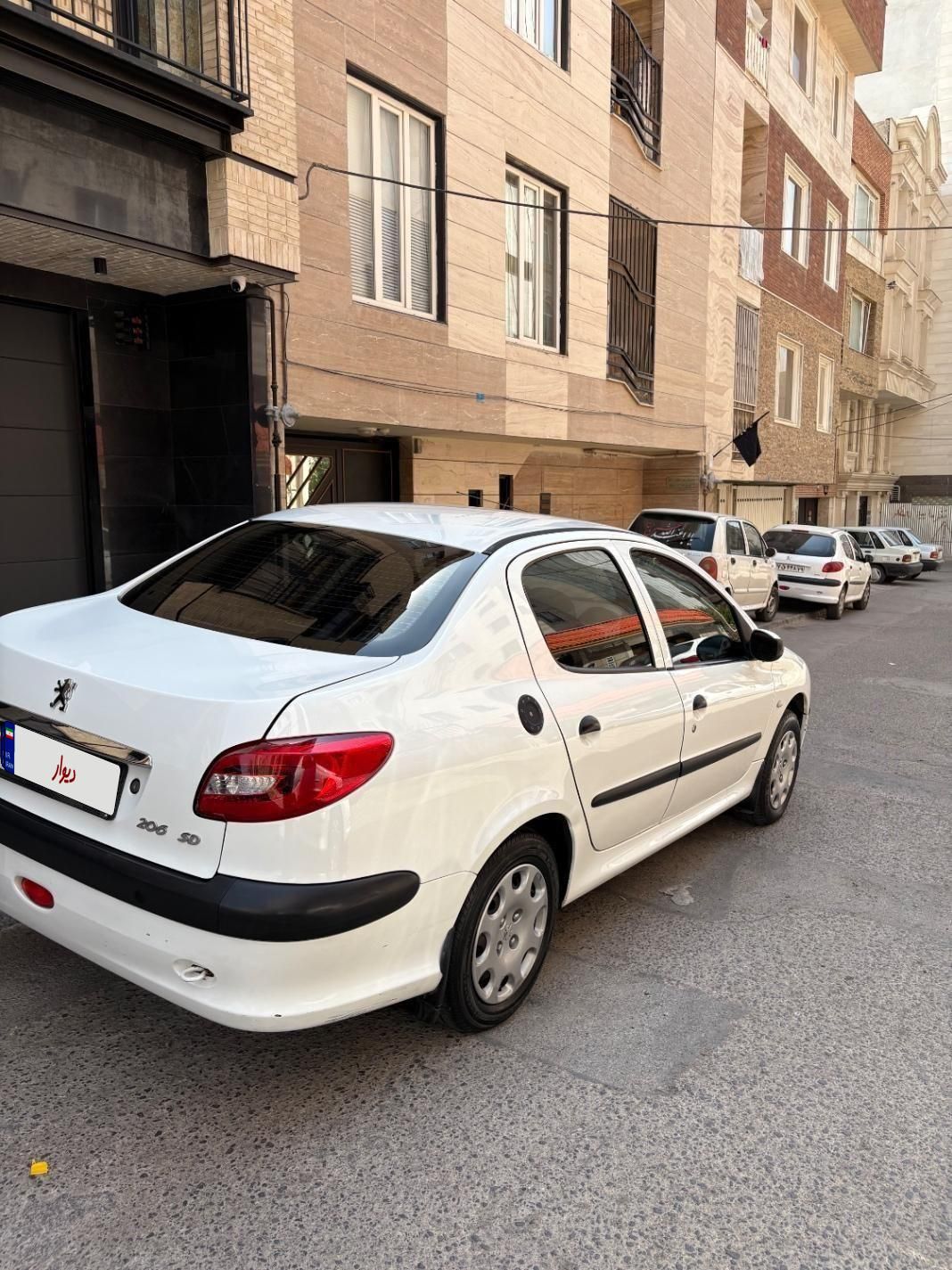 پژو ۲۰۶ صندوق دار v8 - 1396