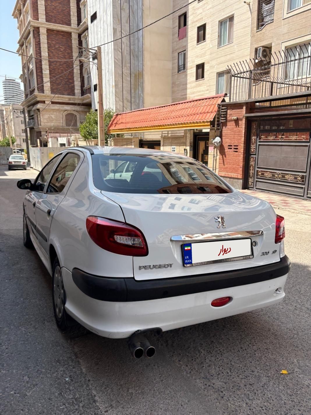 پژو ۲۰۶ صندوق دار v8 - 1396