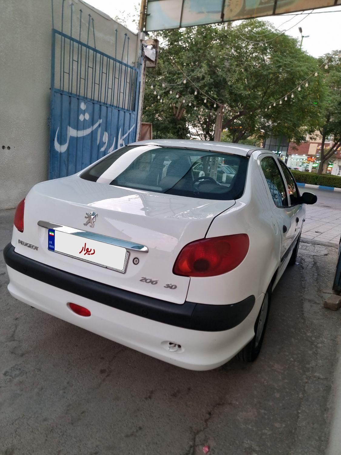 پژو ۲۰۶ صندوق دار v8 - 1396