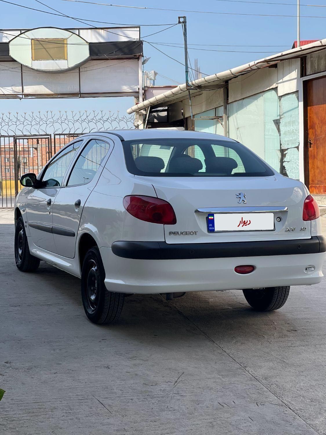 پژو ۲۰۶ صندوق دار v8 - 1395