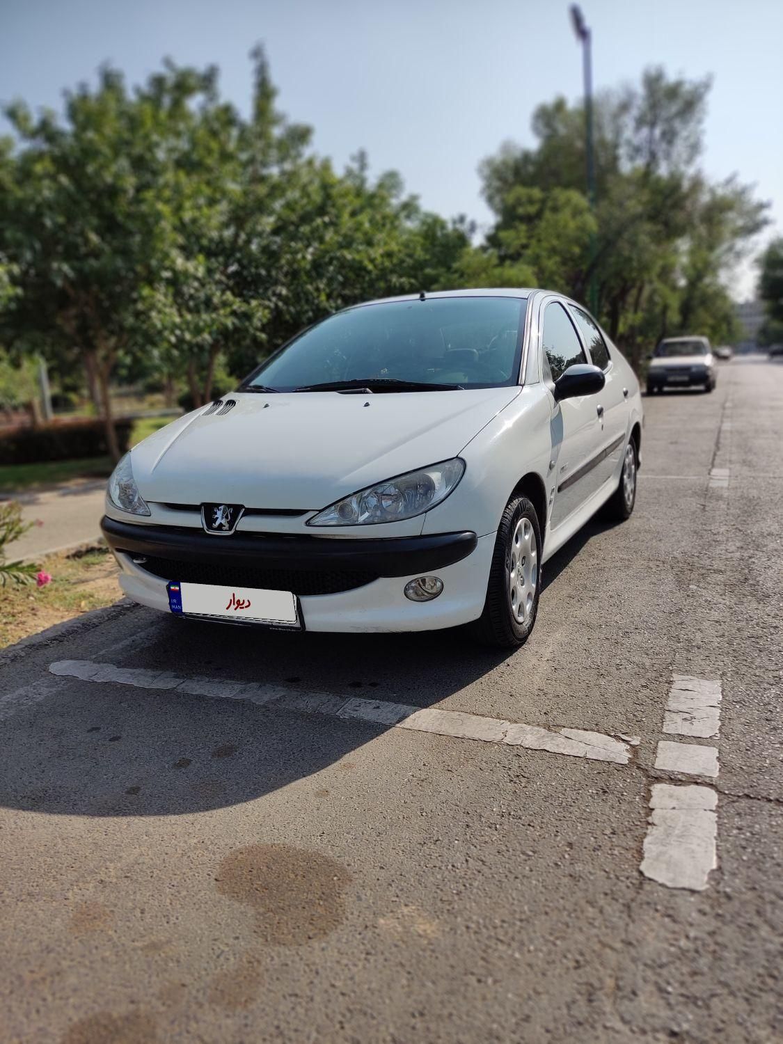 پژو ۲۰۶ صندوق دار v8 - 1396