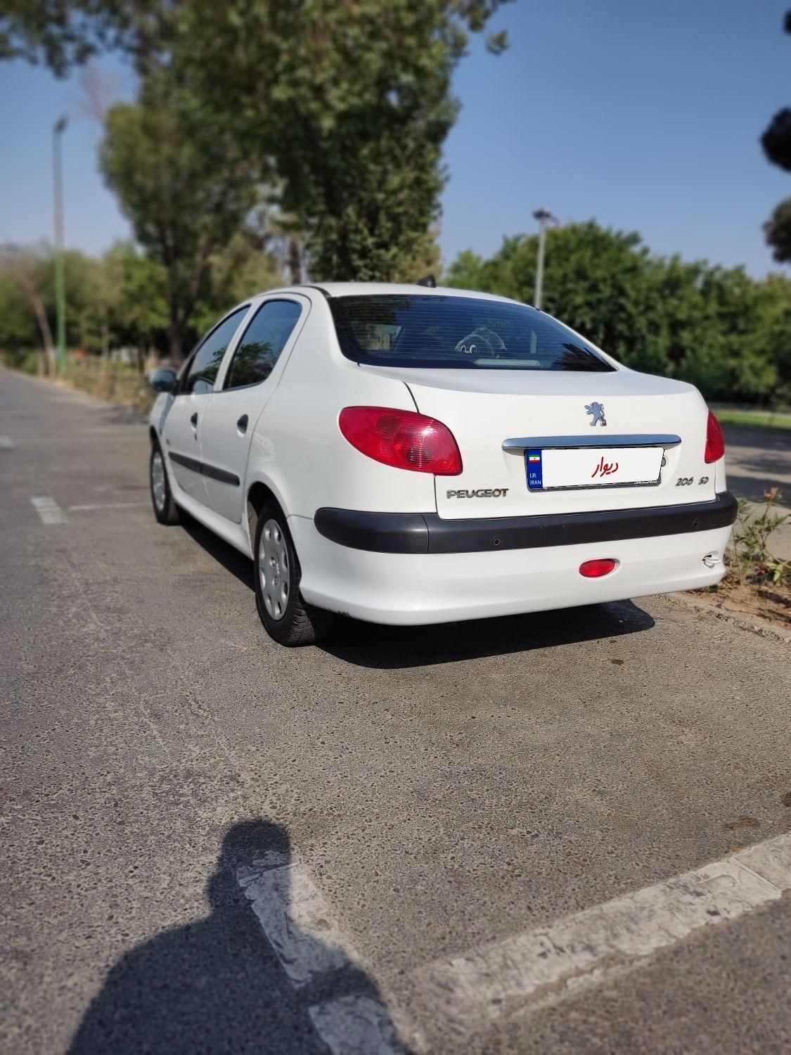پژو ۲۰۶ صندوق دار v8 - 1396