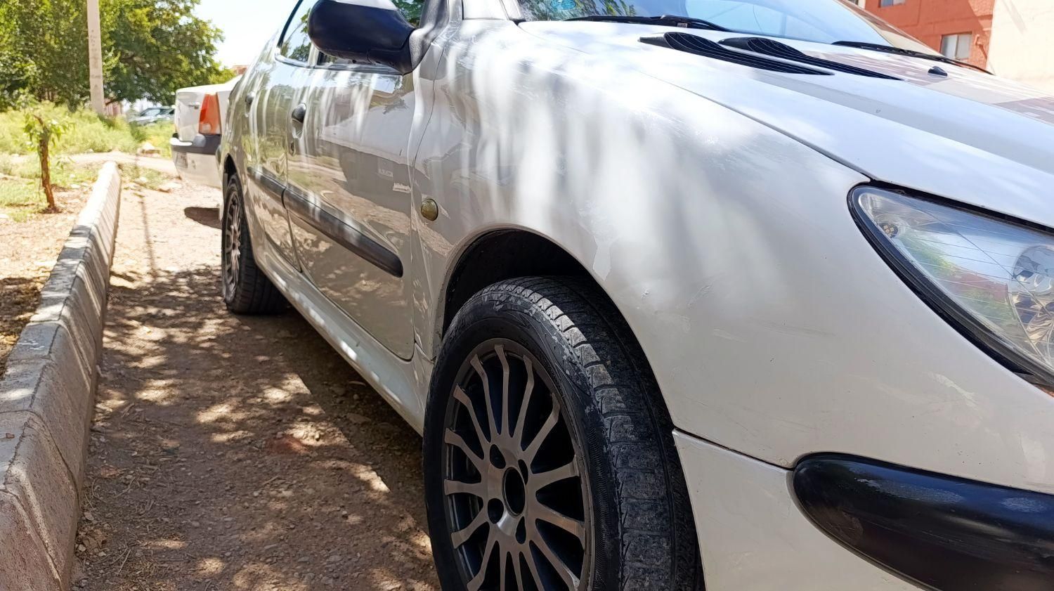 پژو ۲۰۶ صندوق دار v8 - 1395