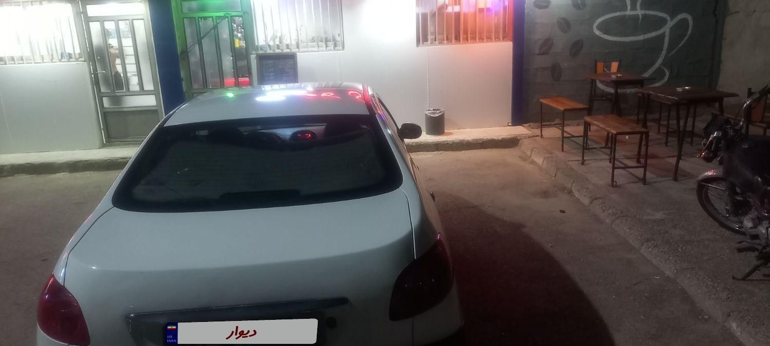 پژو ۲۰۶ صندوق دار v8 - 1396