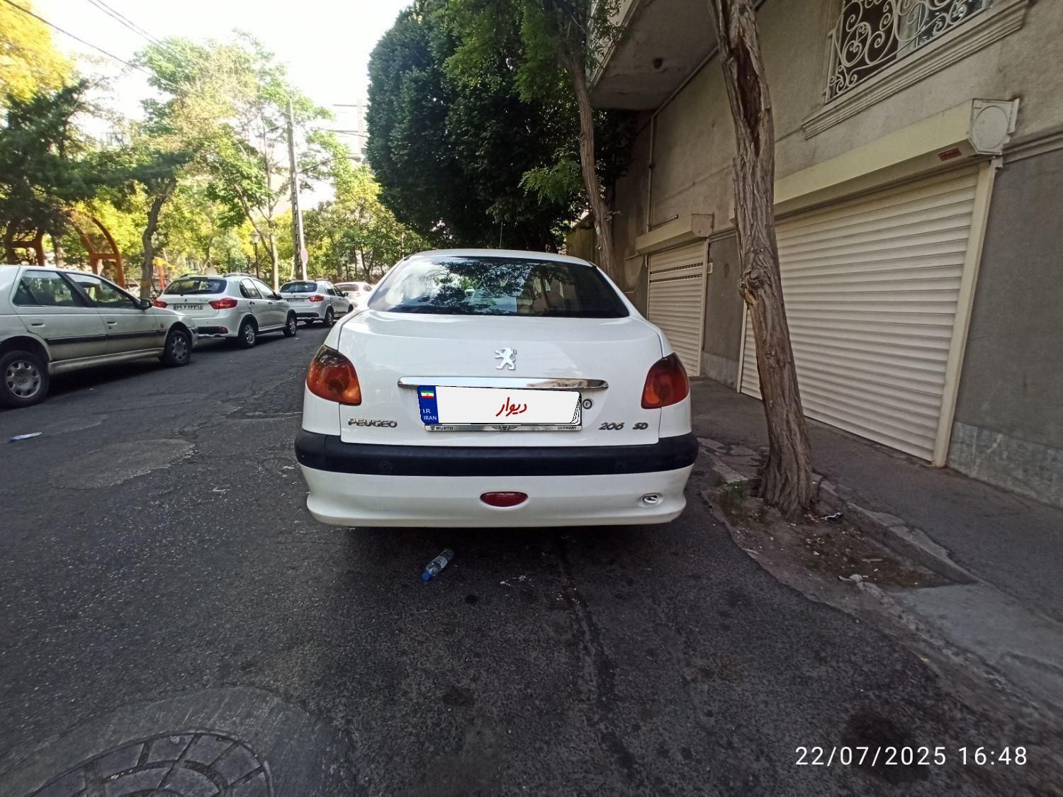 پژو ۲۰۶ صندوق دار v8 - 1393