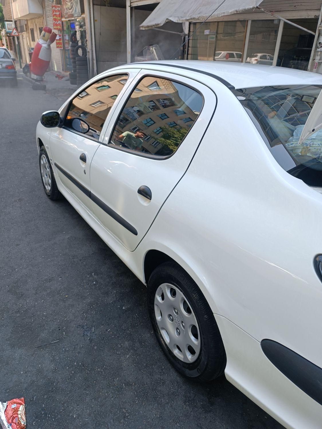 پژو ۲۰۶ صندوق دار v8 - 1395