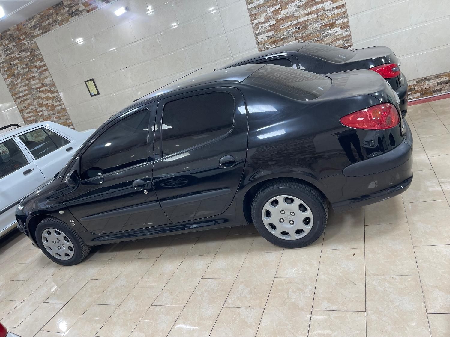 پژو ۲۰۶ صندوق دار v8 - 1394