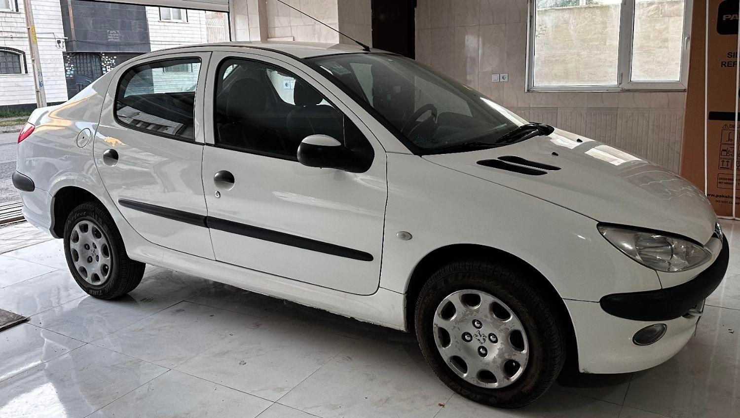 پژو ۲۰۶ صندوق دار v8 - 1395