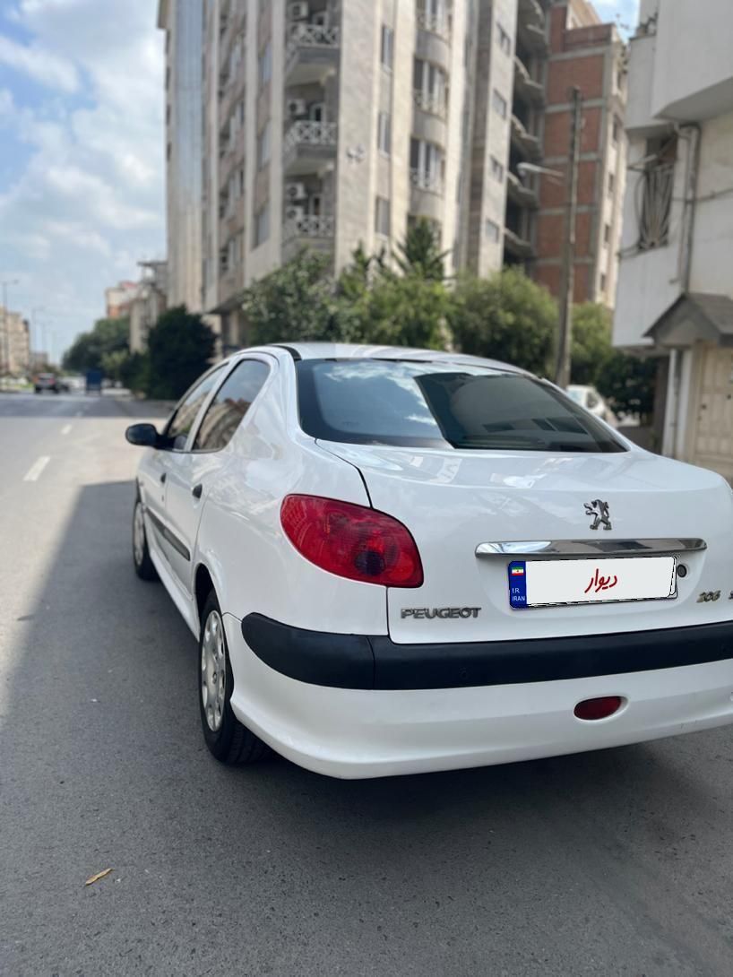 پژو ۲۰۶ صندوق دار v8 - 1393