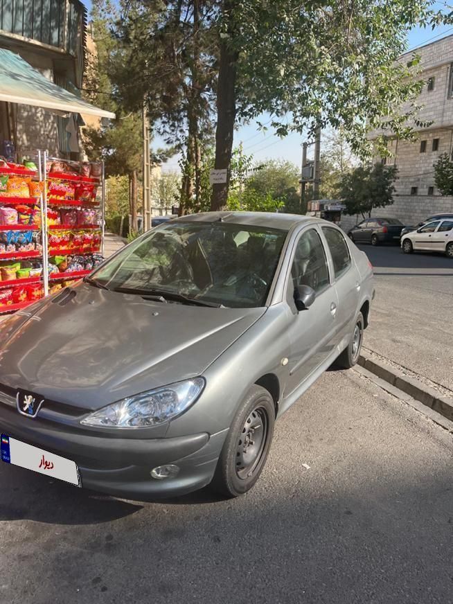پژو ۲۰۶ صندوق دار v8 - 1394