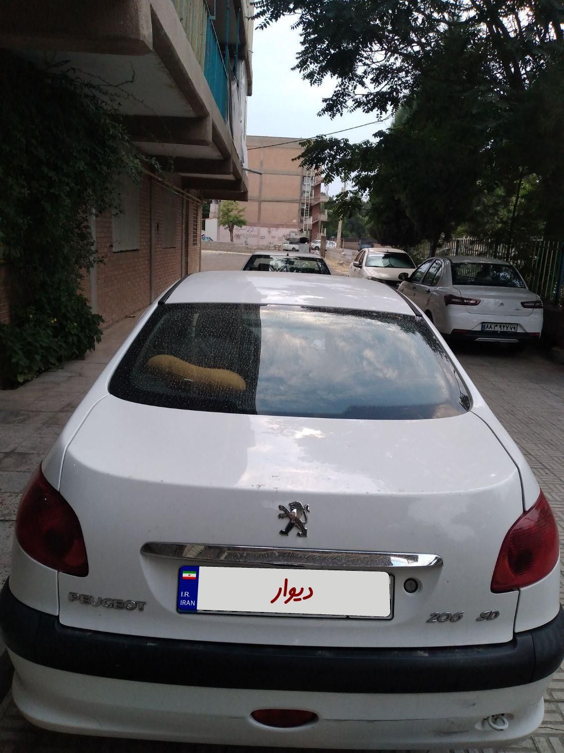 پژو ۲۰۶ صندوق دار v8 - 1396