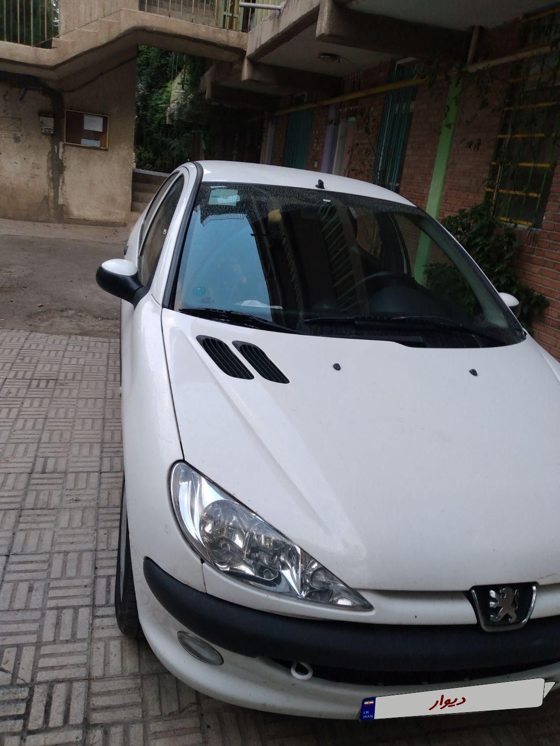 پژو ۲۰۶ صندوق دار v8 - 1396