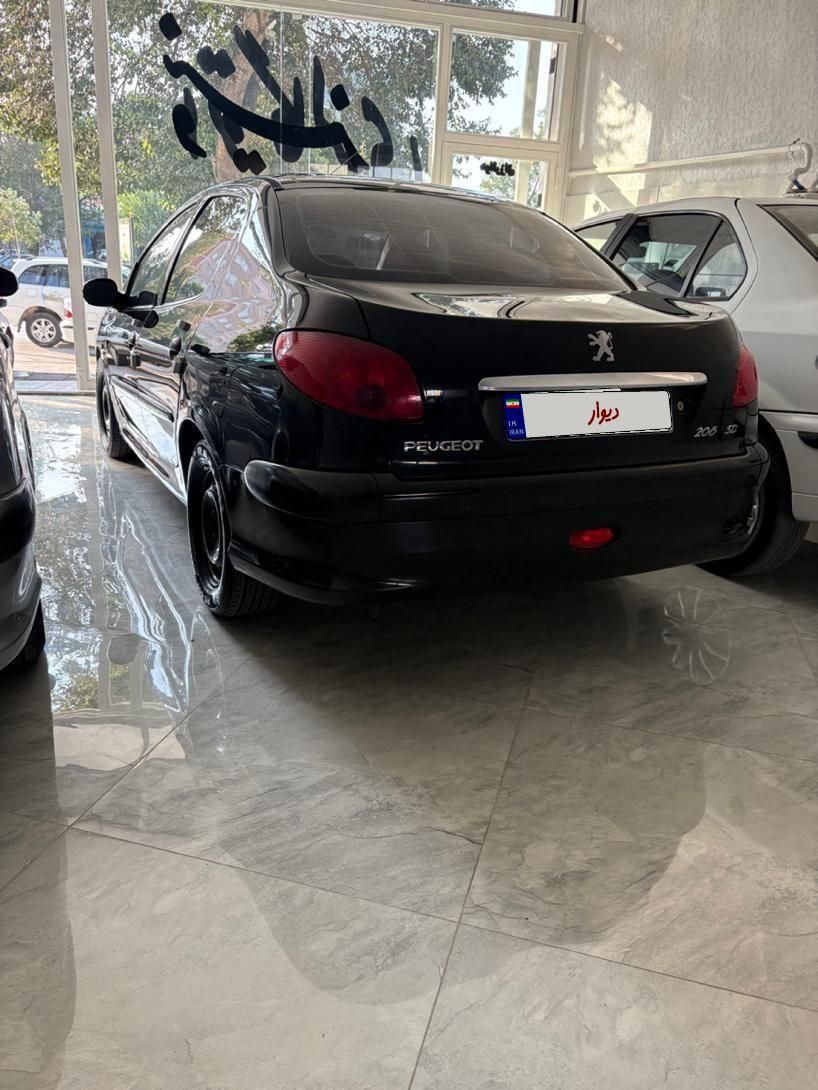 پژو ۲۰۶ صندوق دار v8 - 1394