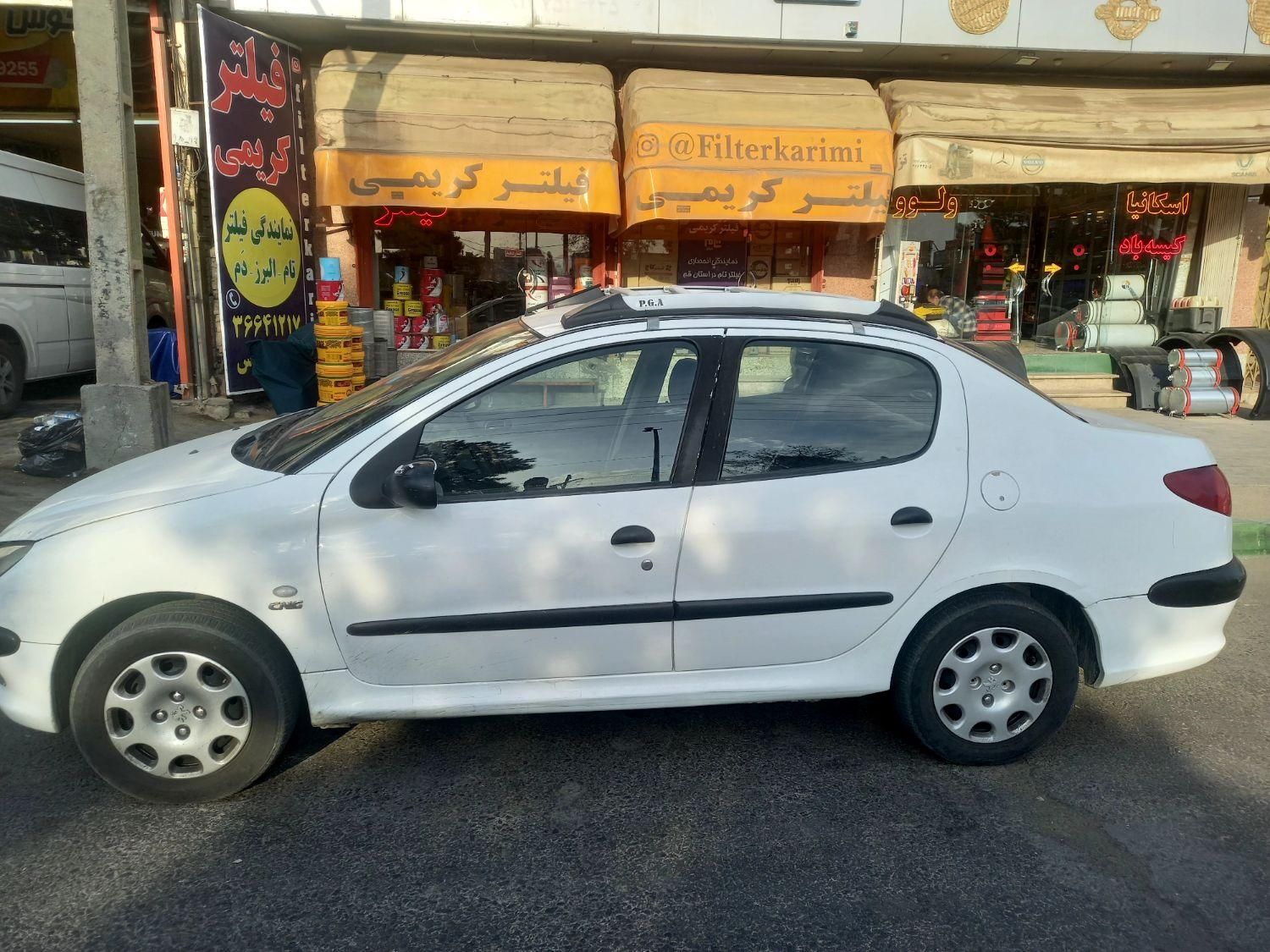 پژو ۲۰۶ صندوق دار v8 - 1390