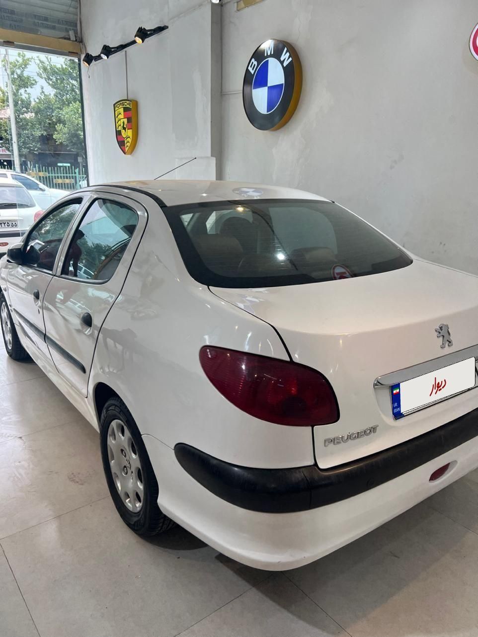 پژو ۲۰۶ صندوق دار v8 - 1395