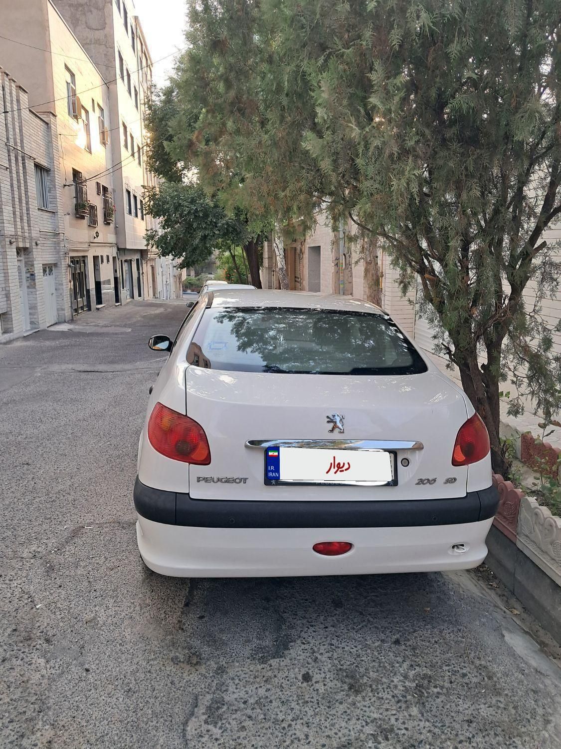 پژو ۲۰۶ صندوق دار v8 - 1395