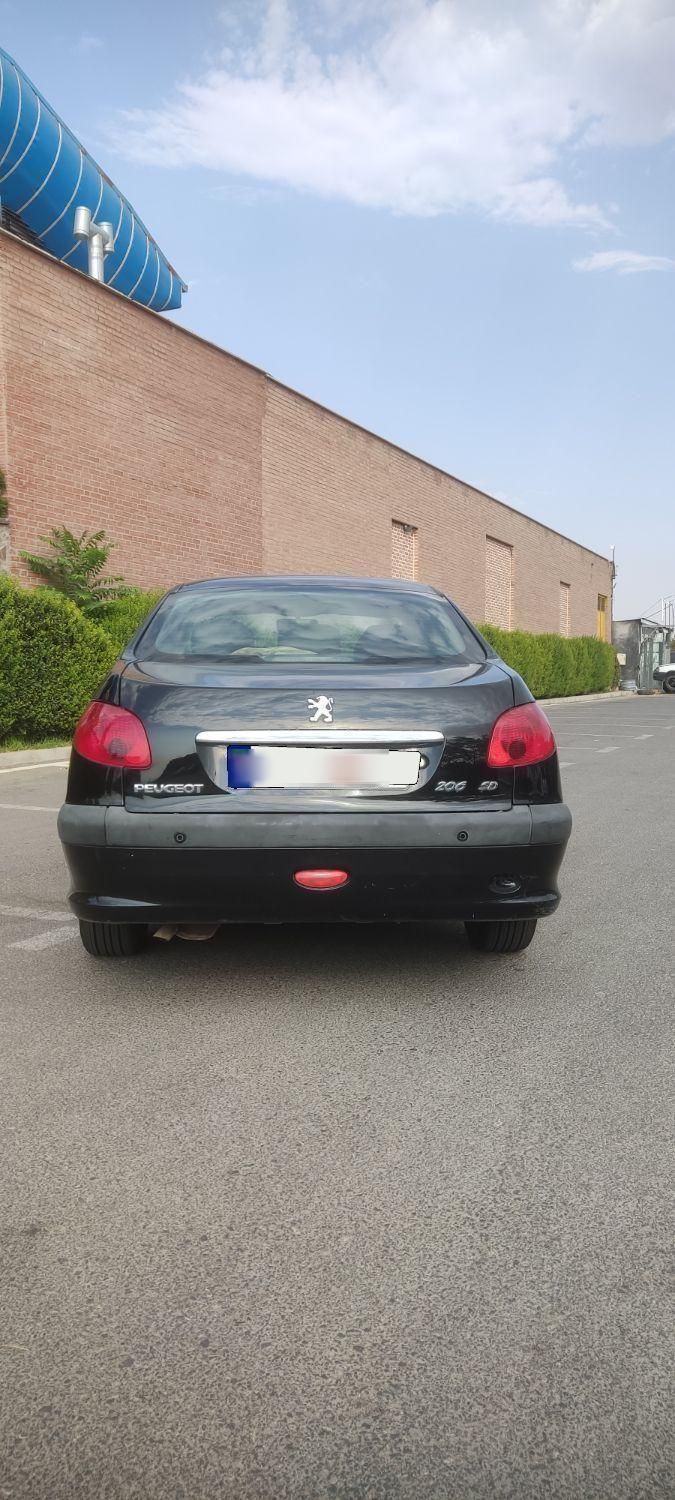 پژو ۲۰۶ صندوق دار v8 - 1394