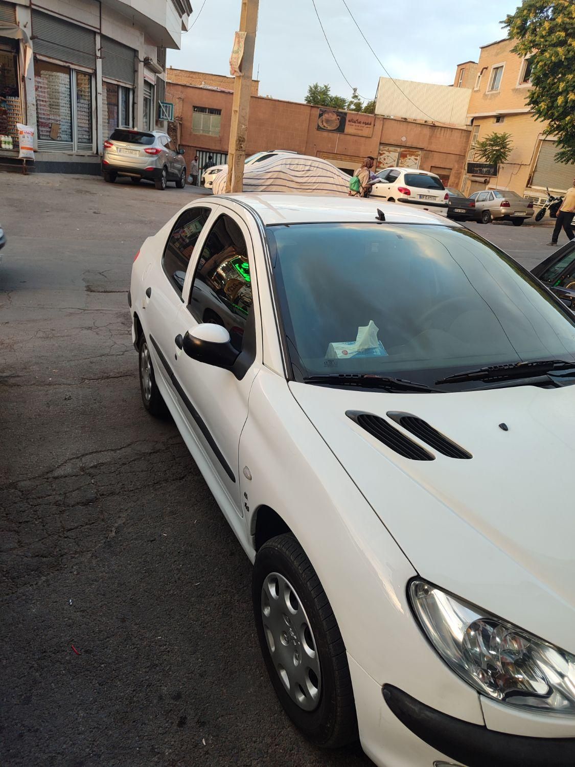پژو ۲۰۶ صندوق دار v8 - 1390