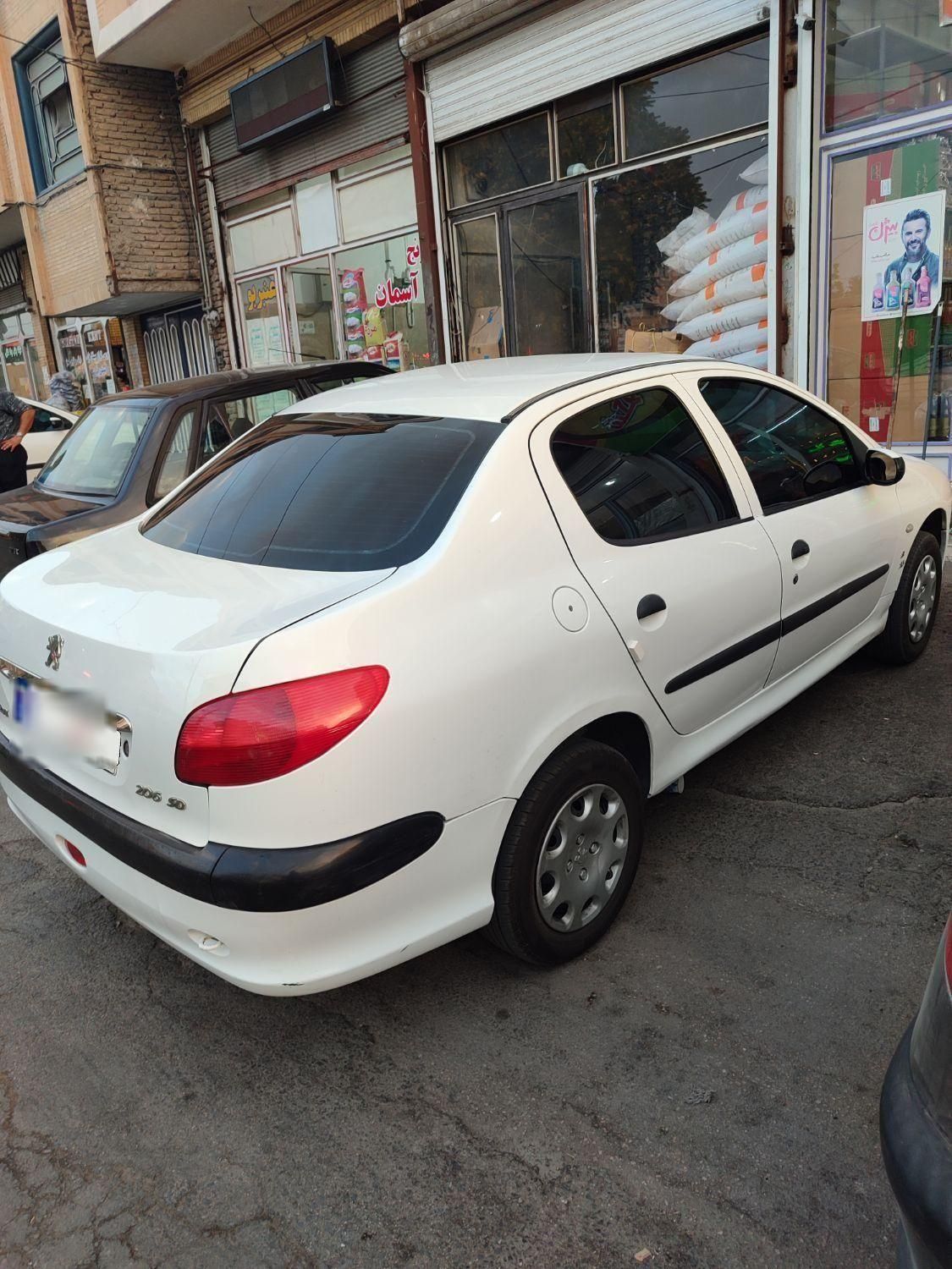 پژو ۲۰۶ صندوق دار v8 - 1390