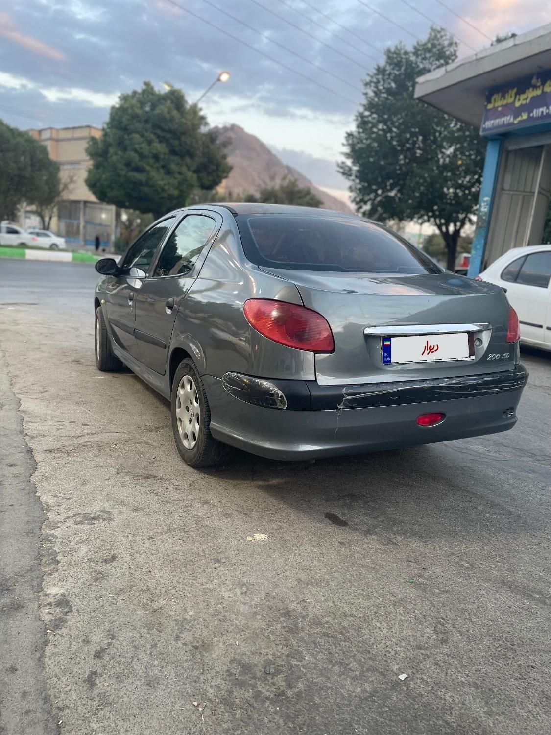 پژو ۲۰۶ صندوق دار v8 - 1390