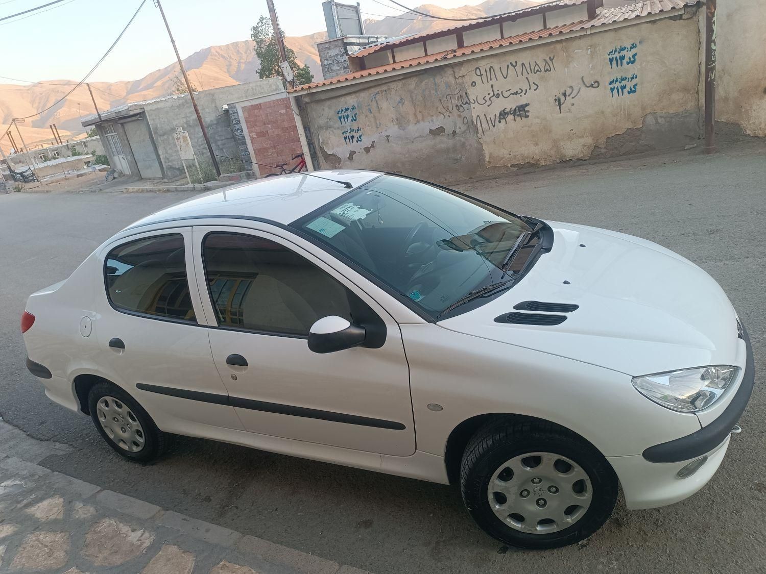 پژو ۲۰۶ صندوق دار v8 - 1397