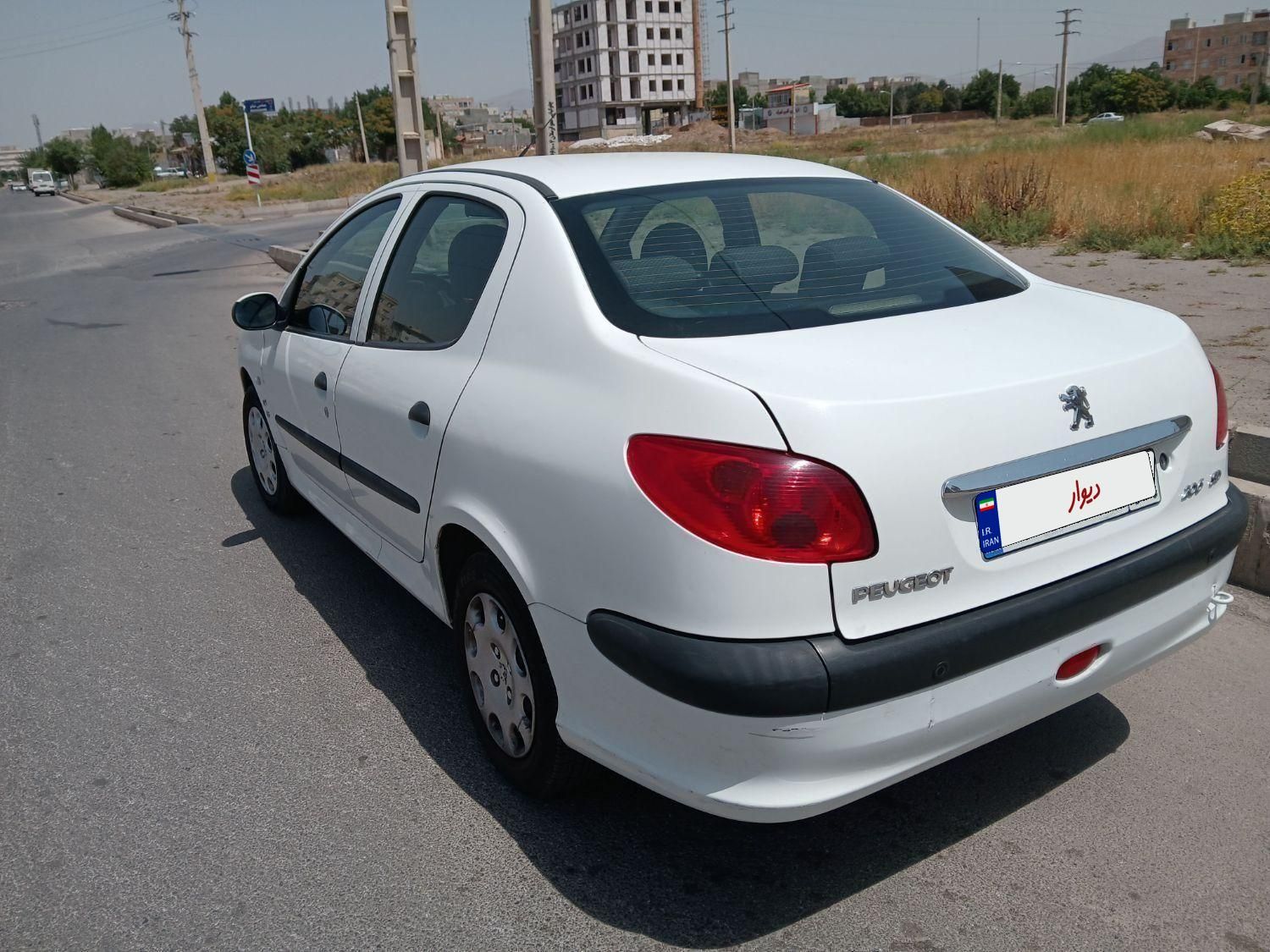 پژو ۲۰۶ صندوق دار v8 - 1396