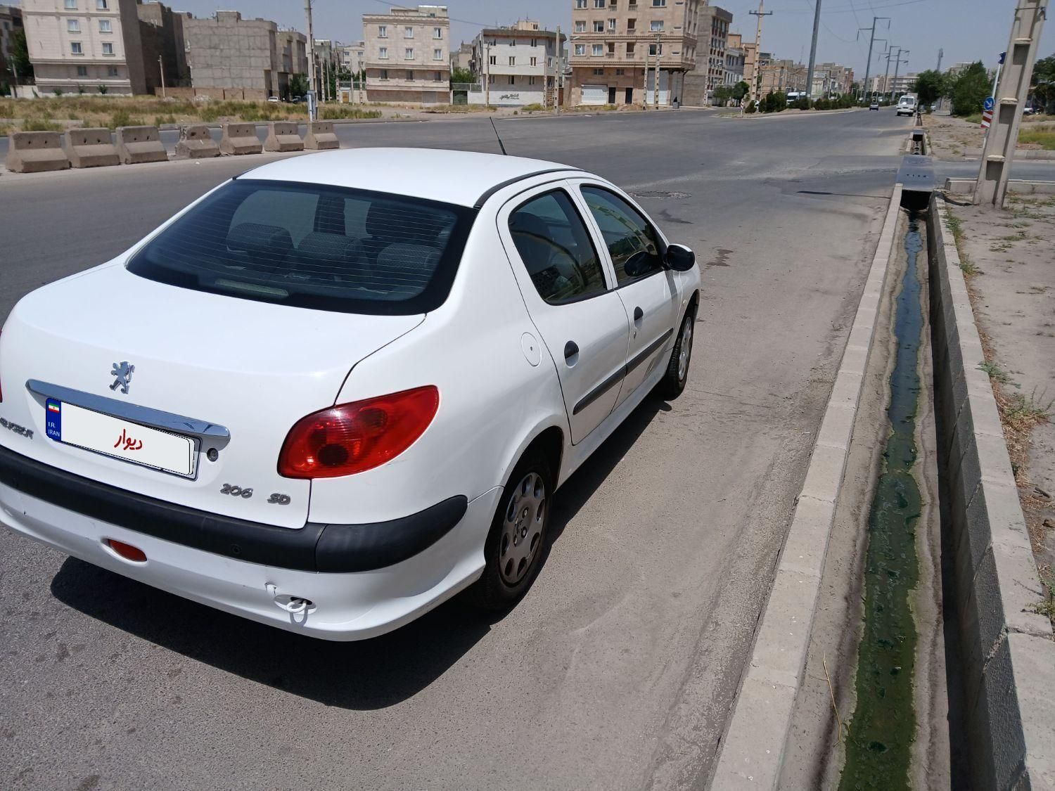 پژو ۲۰۶ صندوق دار v8 - 1396