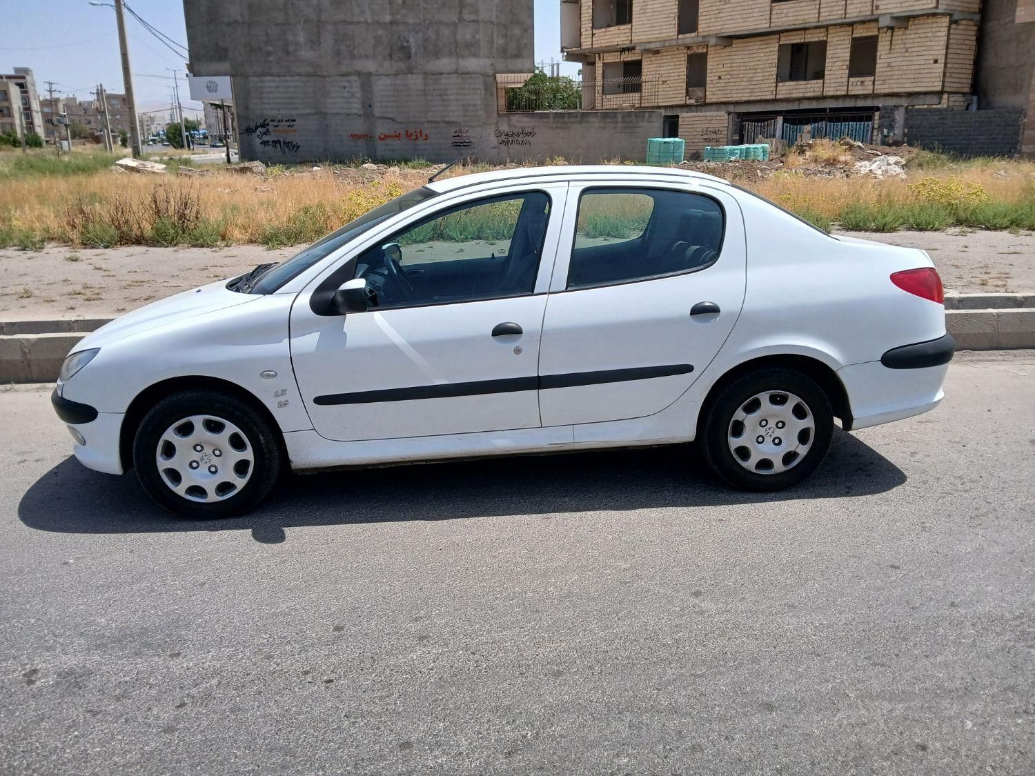 پژو ۲۰۶ صندوق دار v8 - 1396