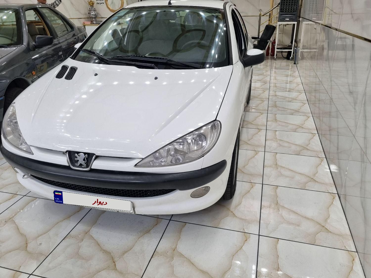 پژو ۲۰۶ صندوق دار v8 - 1396