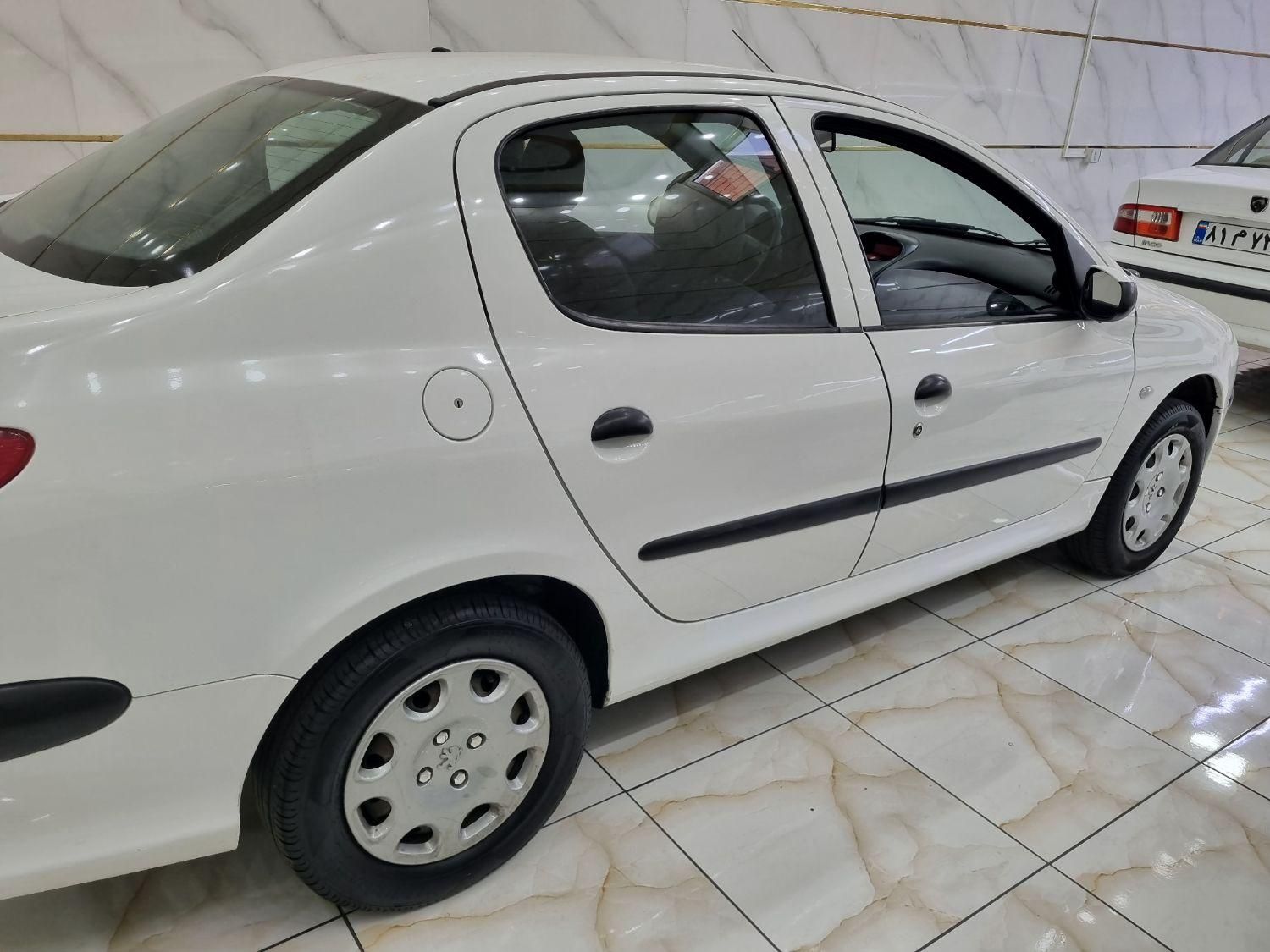 پژو ۲۰۶ صندوق دار v8 - 1396