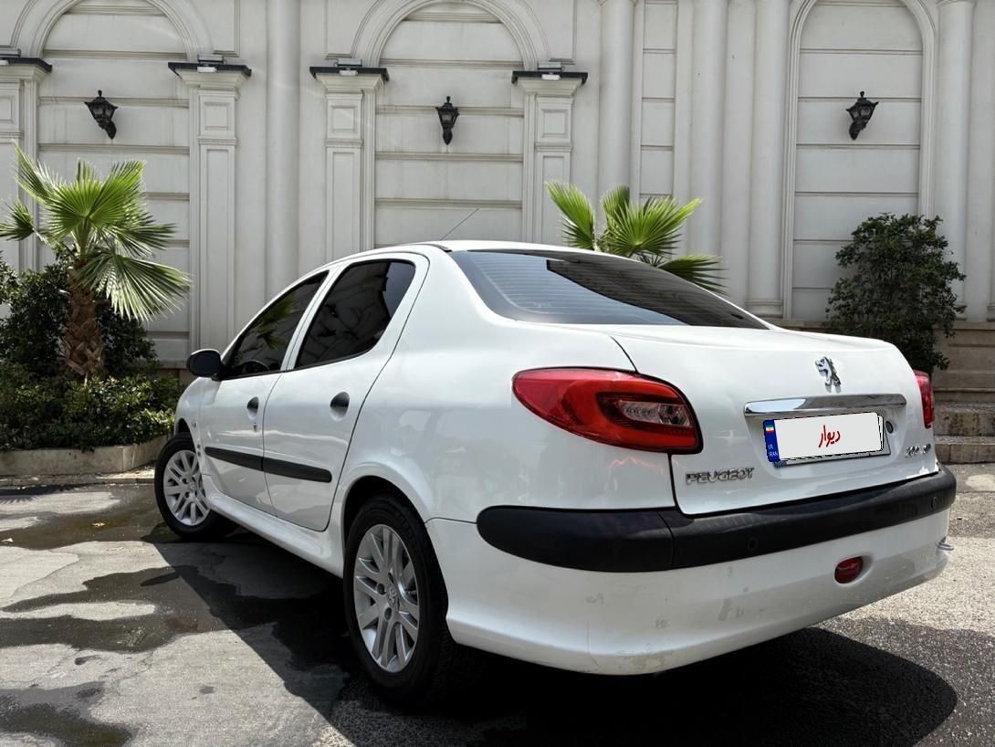 پژو ۲۰۶ صندوق دار v8 - 1396