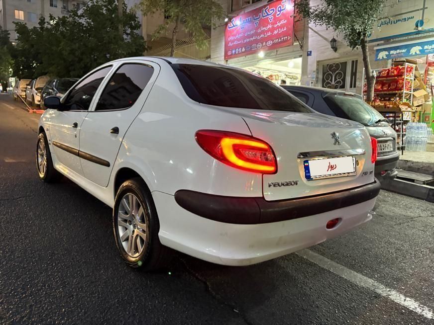 پژو ۲۰۶ صندوق دار v8 - 1396
