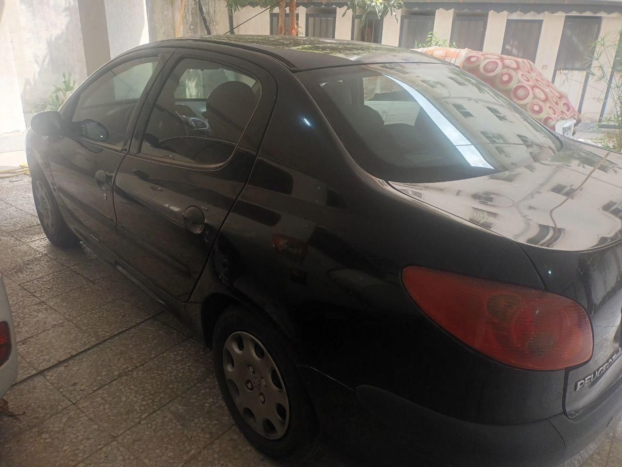 پژو ۲۰۶ صندوق دار v8 - 1394