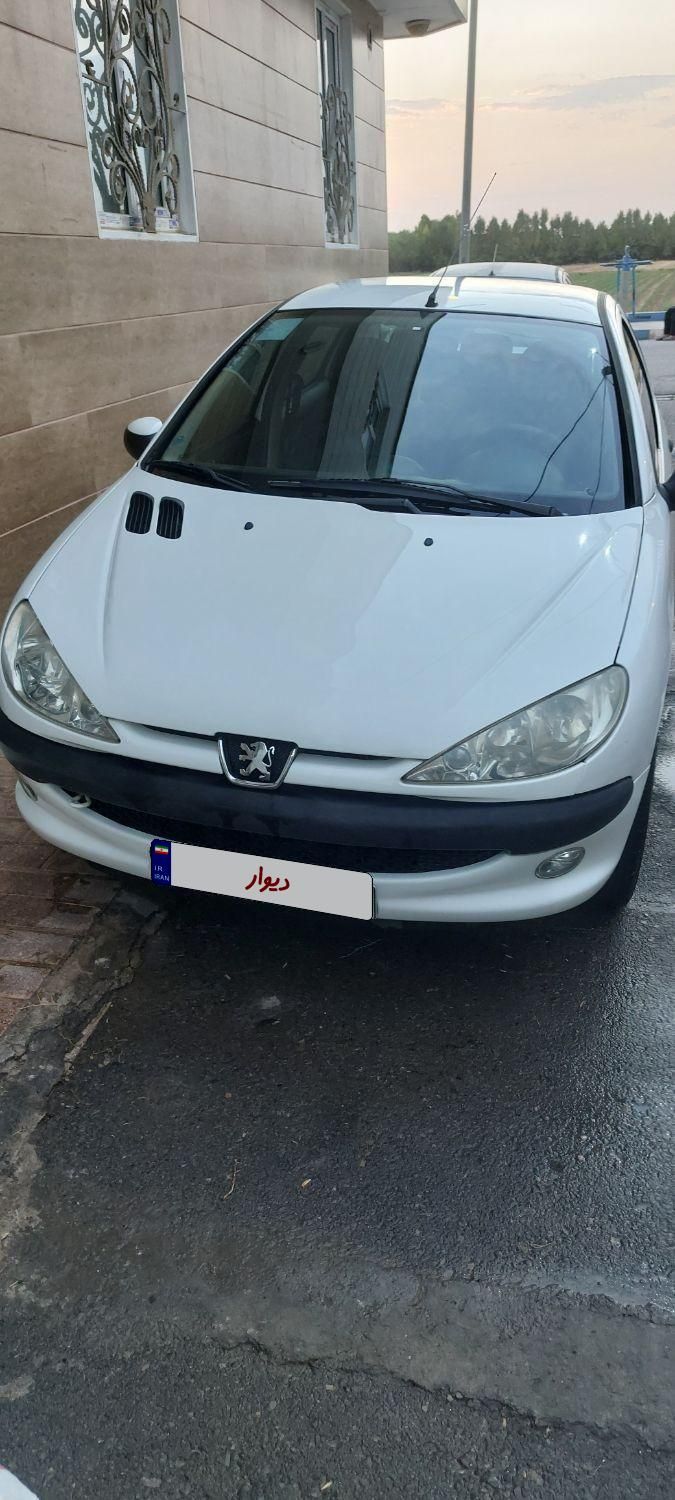 پژو ۲۰۶ صندوق دار v8 - 1396