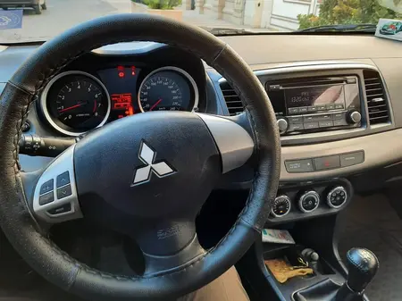میتسوبیشی لنسر 1.6 لیتر دنده ای - 2014
