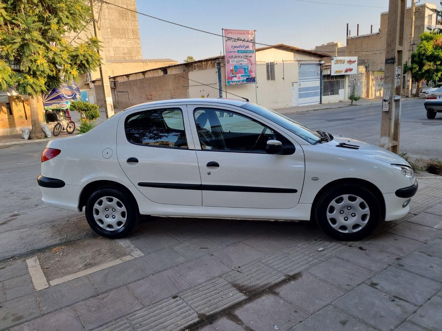 پژو ۲۰۶ صندوق دار v8 - 1396